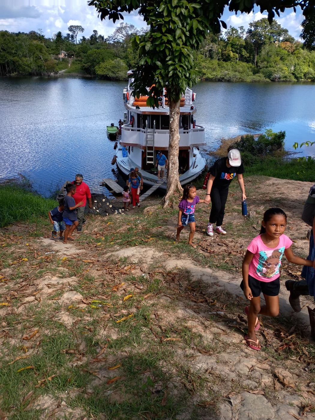 Children beside the ministry boat on the Amazon, Brazil